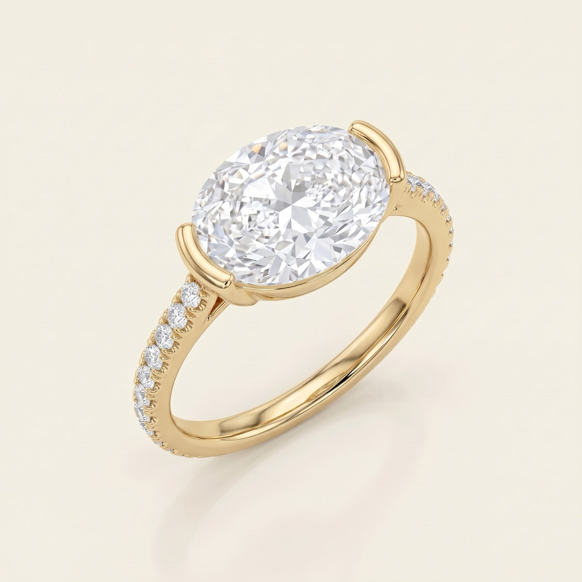 14K Yellow Gold East-West Oval Diamond Engagement Ring with Half-Bezel and Pavé Band