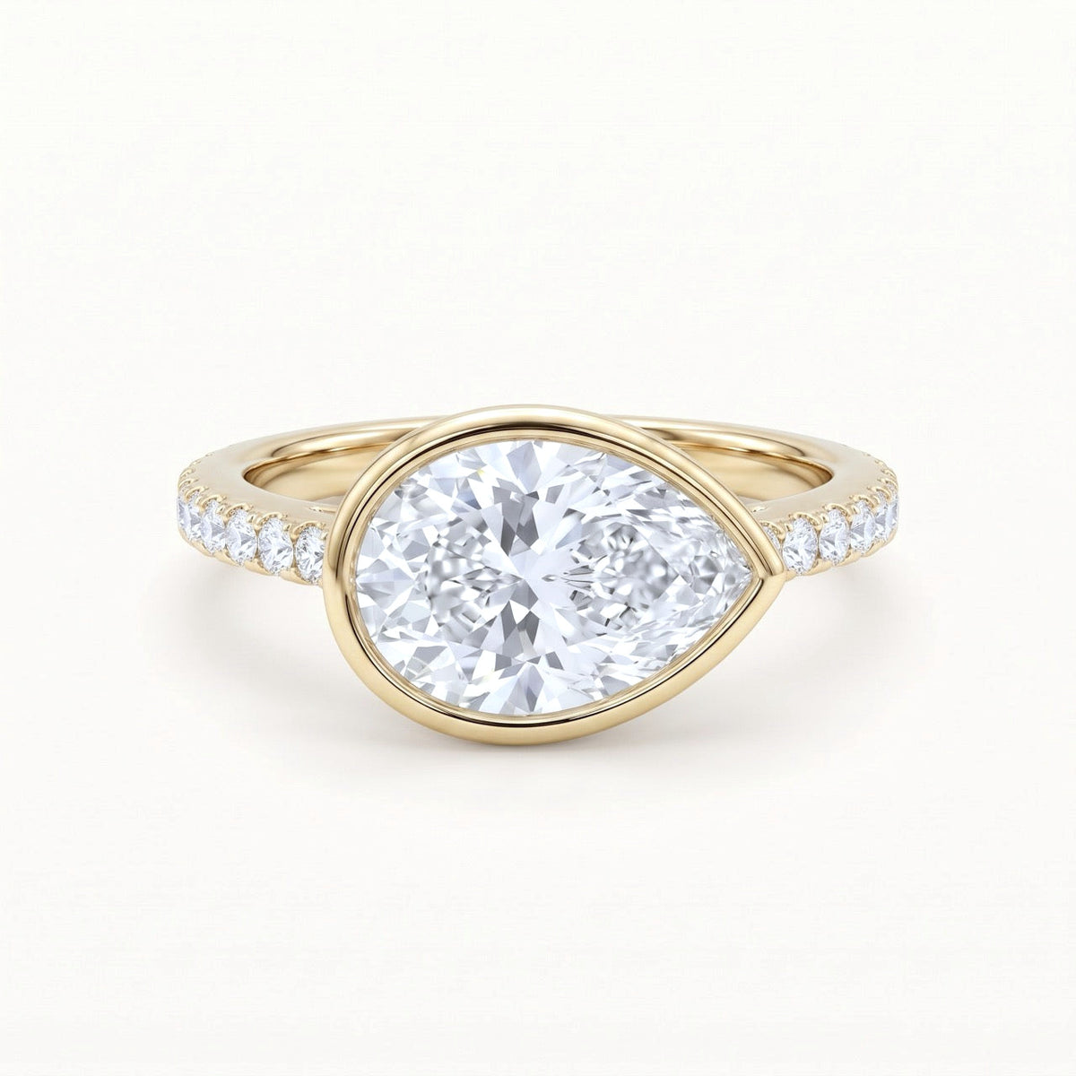 East-West Pear Diamond Bezel Engagement Ring in 14K Gold