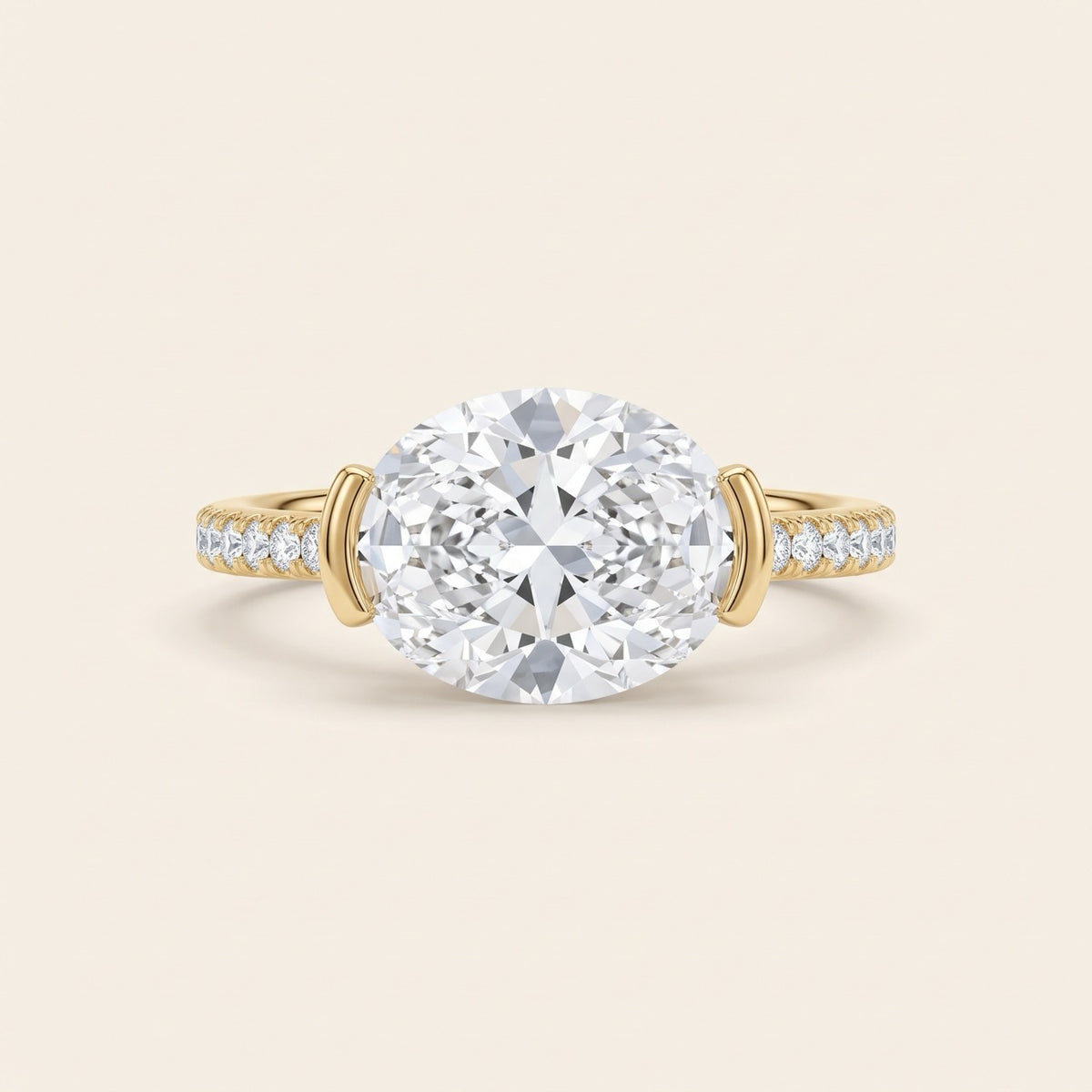 14K Yellow Gold East-West Oval Diamond Engagement Ring with Half-Bezel and Pavé Band