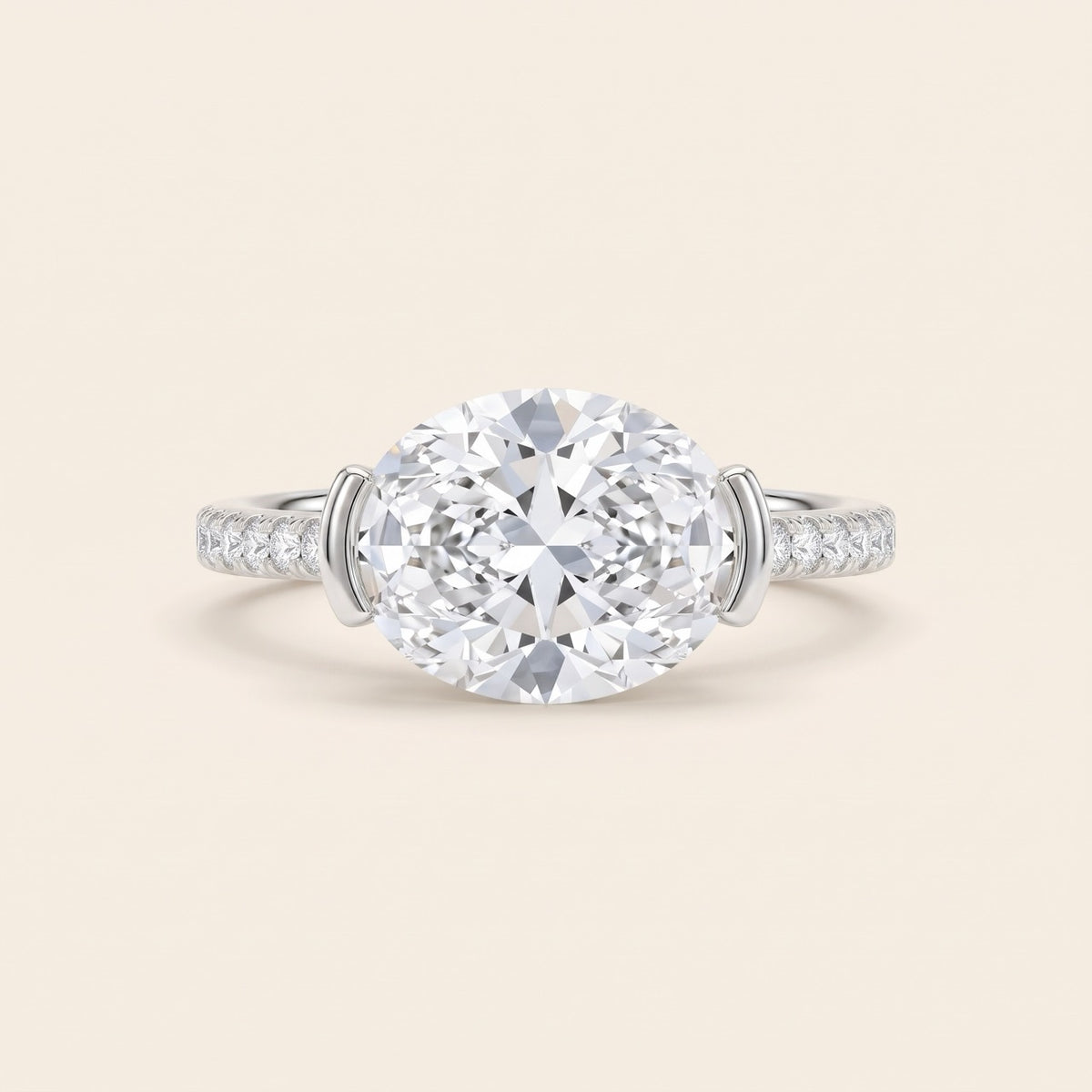 14K Yellow Gold East-West Oval Diamond Engagement Ring with Half-Bezel and Pavé Band