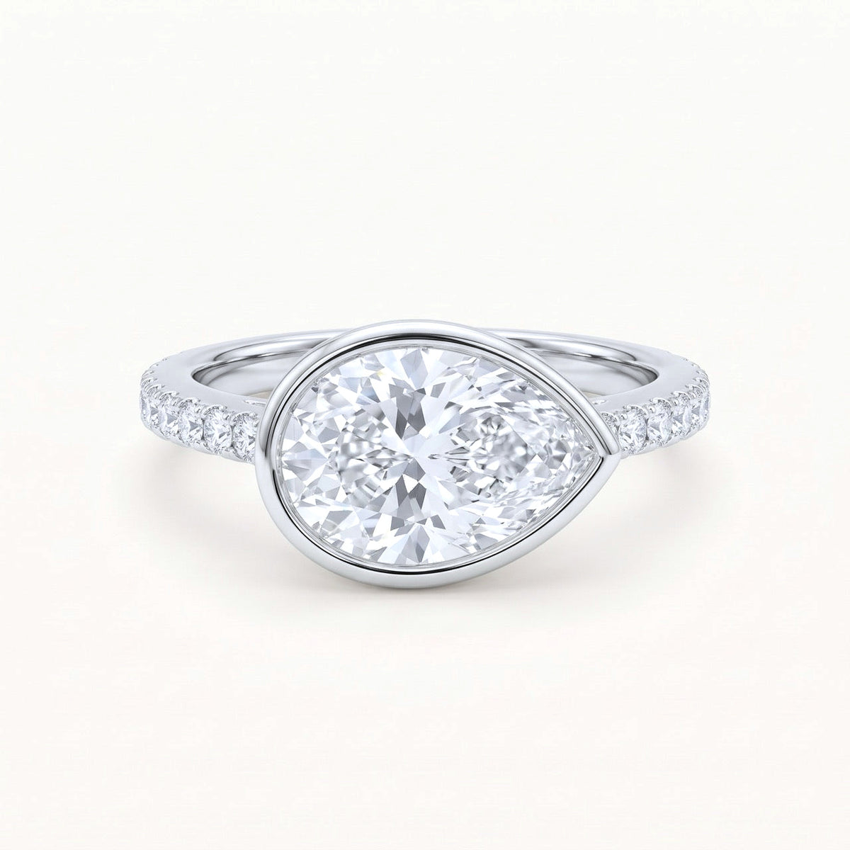 East-West Pear Diamond Bezel Engagement Ring in 14K Gold