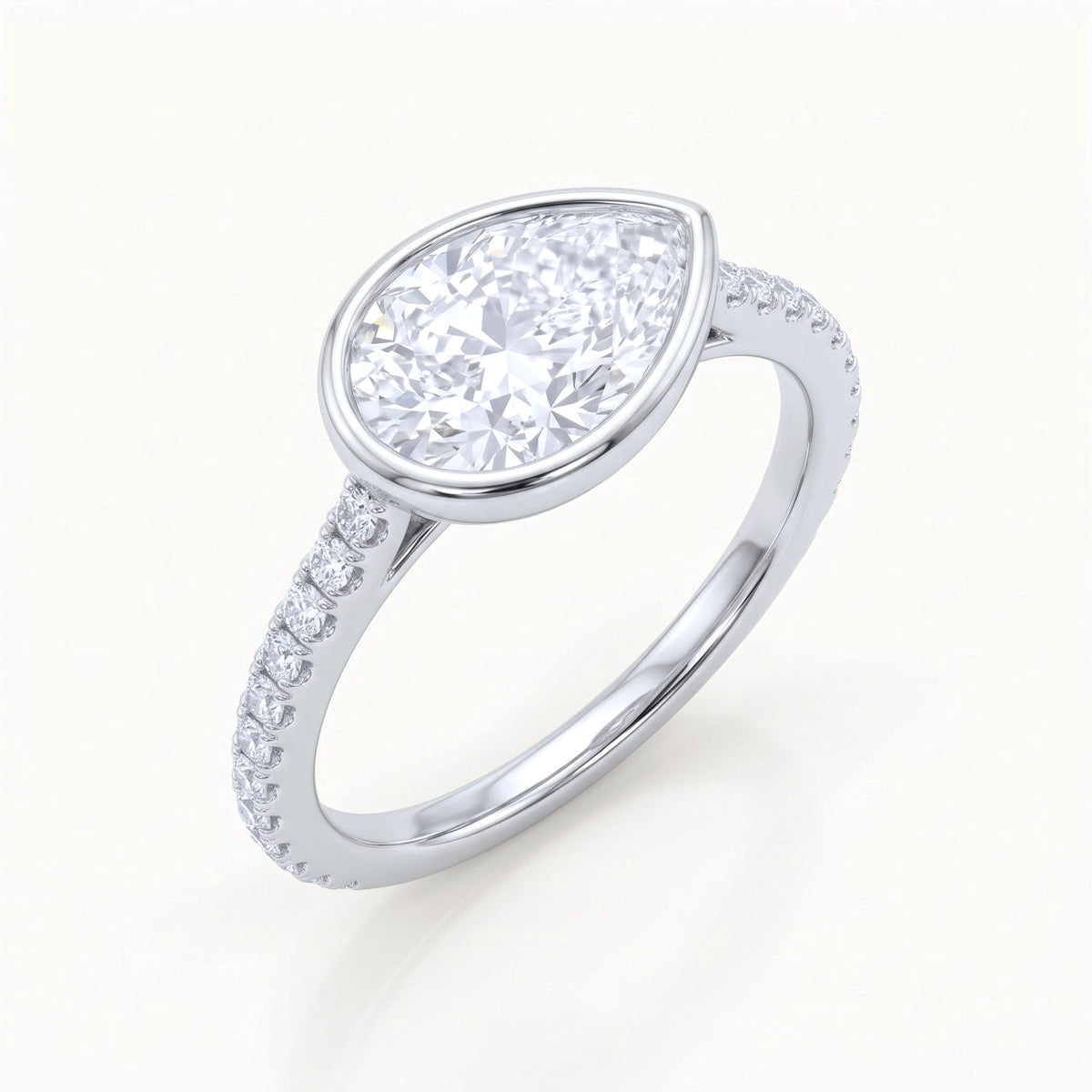 East-West Pear Diamond Bezel Engagement Ring in 14K Gold